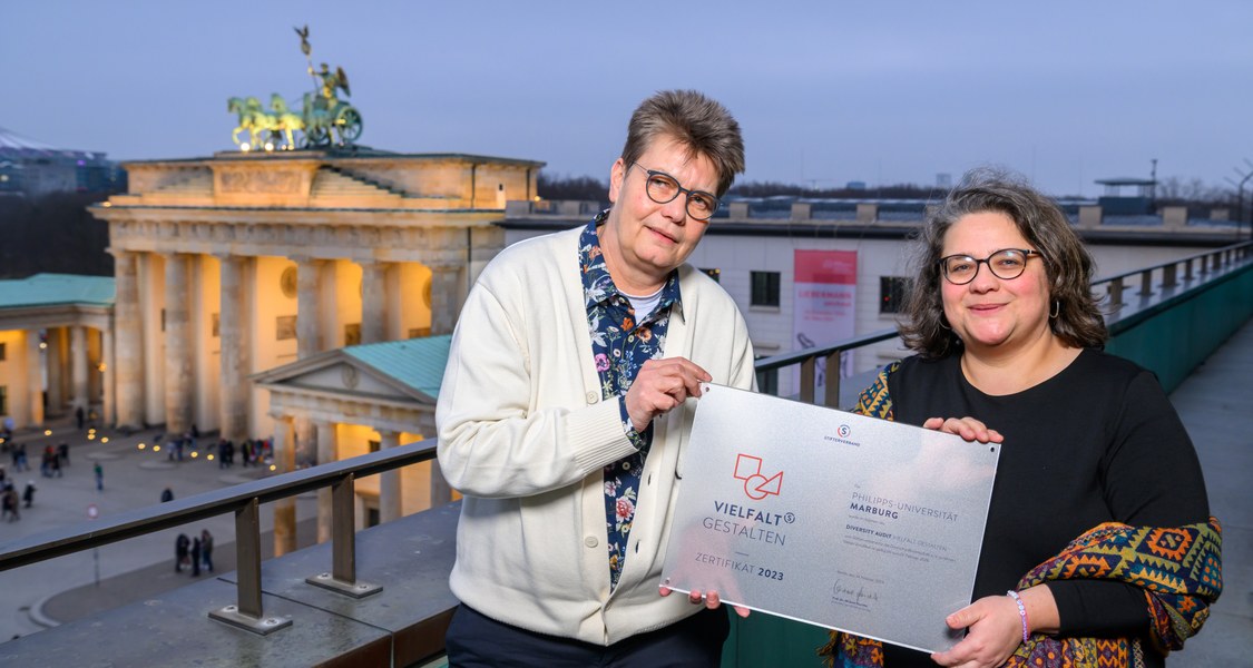 Sabine Pankuweit and Katharina Völsch in Berlin, with the Brandenburg Gate in the background